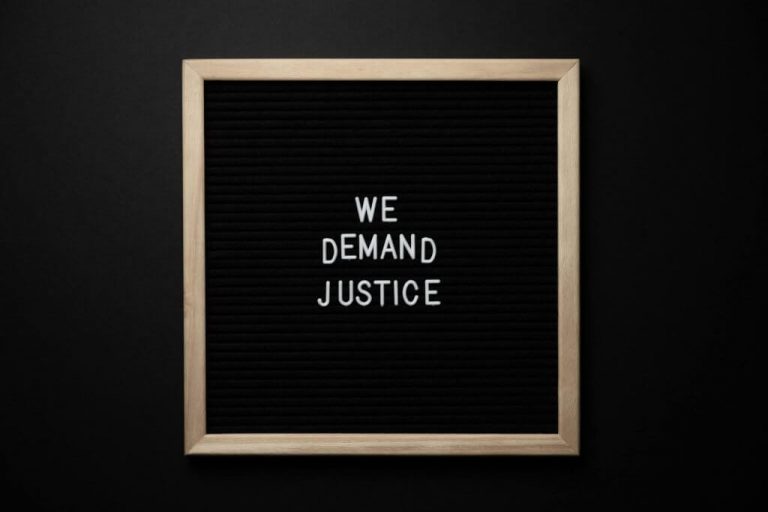We demand justice sign